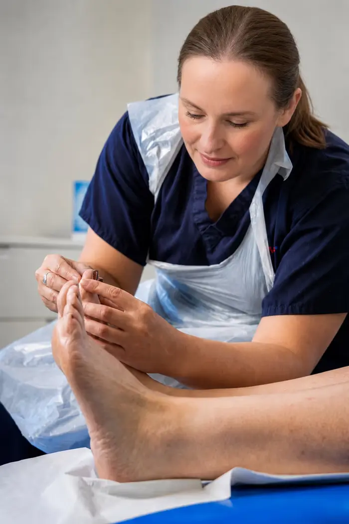Clinician reducing and treating thickened toenails at Active Step in Fareham